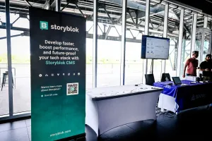 Sponsor booths for Storyblok and Sentry.