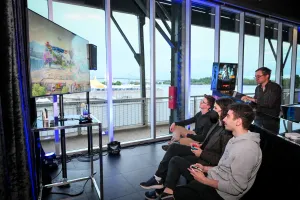 Guests play Super Smash Bros at the video game lounge.