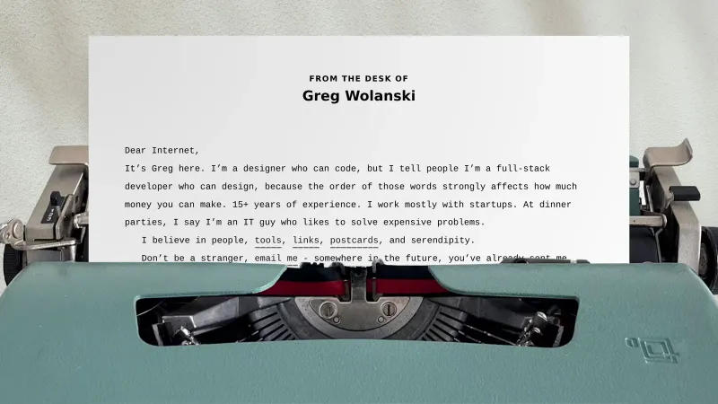 A sheet of paper sticking out of a typewriter, with blog content typed on the page.