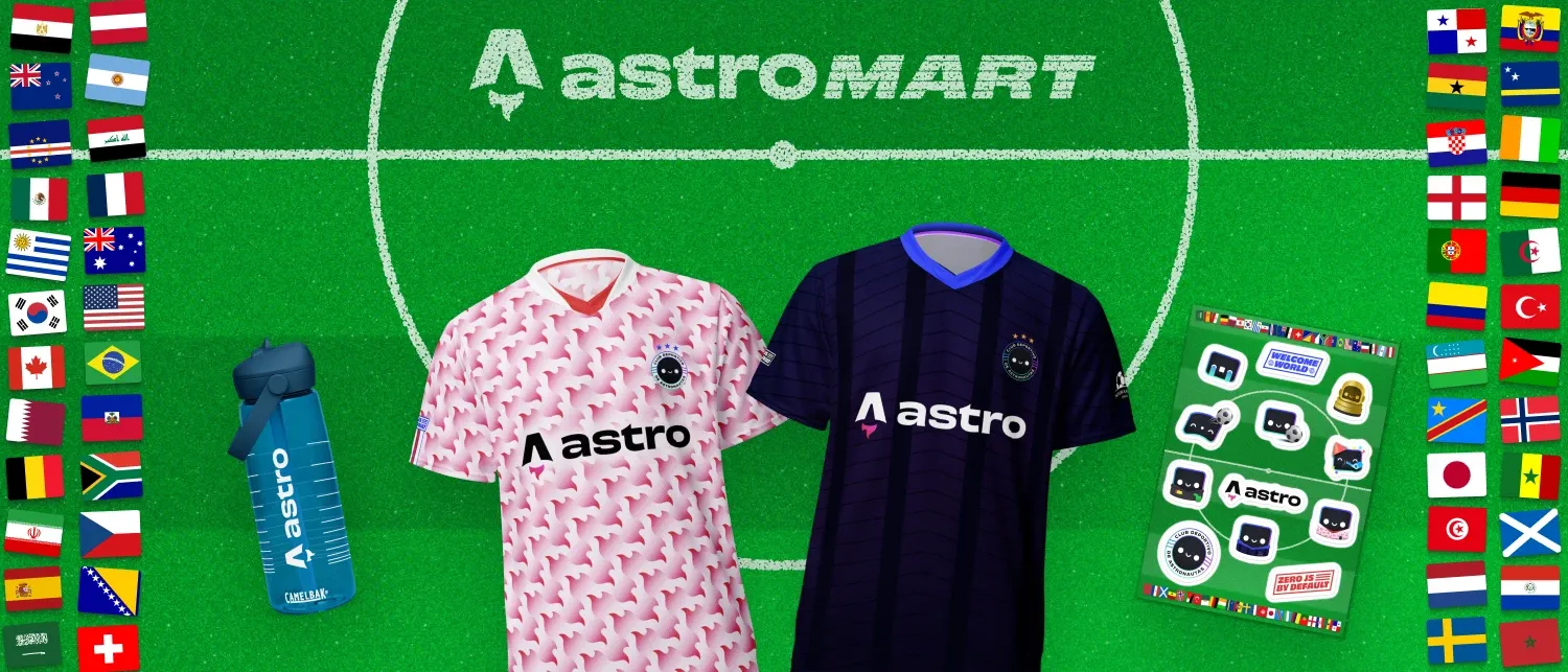 A green soccer pitch with the word AstroMart bordered with 48 country flags displaying Astro football-themed merch: two jerseys, a water bottle and a sticker sheet.
